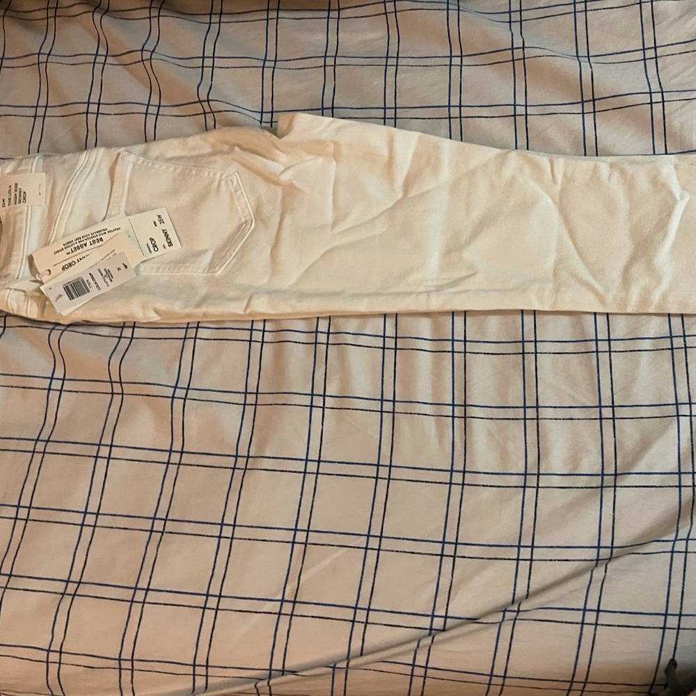 White crop skinny jeans